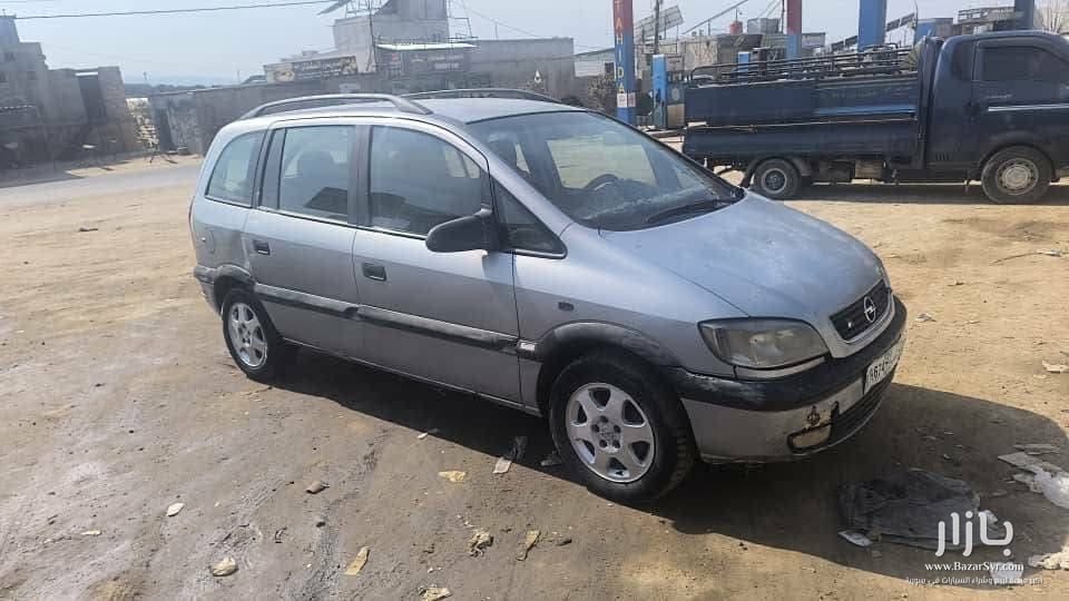 للبيع أوبل زافيرا OPel zafira ادخال أوربي قديم م 2002 خالية من الداخل بخ زنار محرك ديزل تيربو 125حصان 2171cc للبيع أوبل زافيرا OPel zafira ادخال أوربي قديم م 2002 خالية من الداخل بخ زنار محرك ديزل تيربو 125حصان 2171cc - أوبل - 2002 - محافظة إدلب - صورة 5 من 6