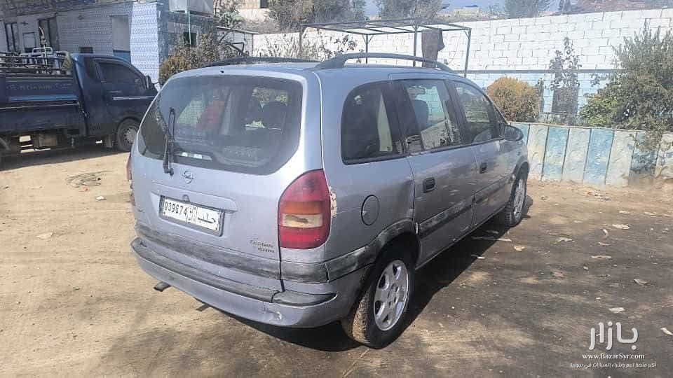 للبيع أوبل زافيرا OPel zafira ادخال أوربي قديم م 2002 خالية من الداخل بخ زنار محرك ديزل تيربو 125حصان 2171cc للبيع أوبل زافيرا OPel zafira ادخال أوربي قديم م 2002 خالية من الداخل بخ زنار محرك ديزل تيربو 125حصان 2171cc - أوبل - 2002 - محافظة إدلب - صورة 6 من 6