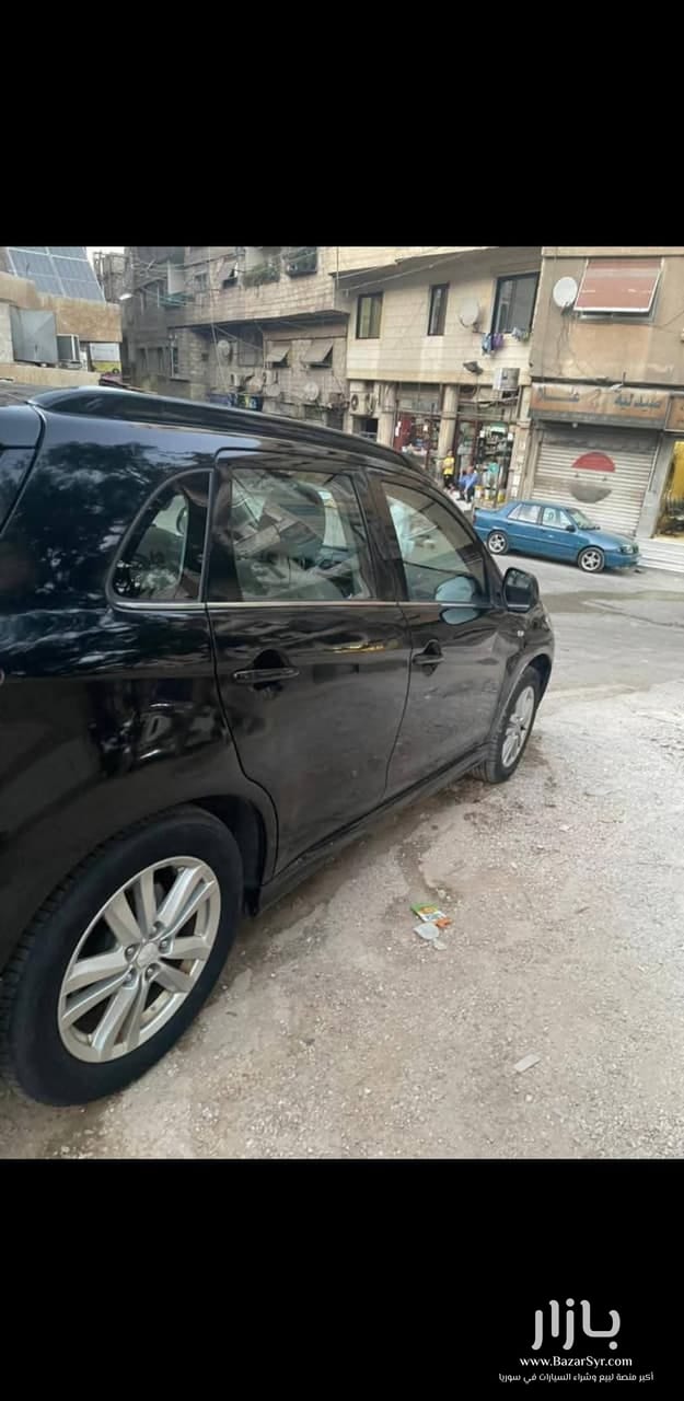 MITSUBISHI_ASX سقف بانوراما مديل 2011 MITSUBISHI_ASX سقف بانوراما مديل 2011 - متسوبيشي - 2011 - محافظة دمشق - صورة 2 من 4