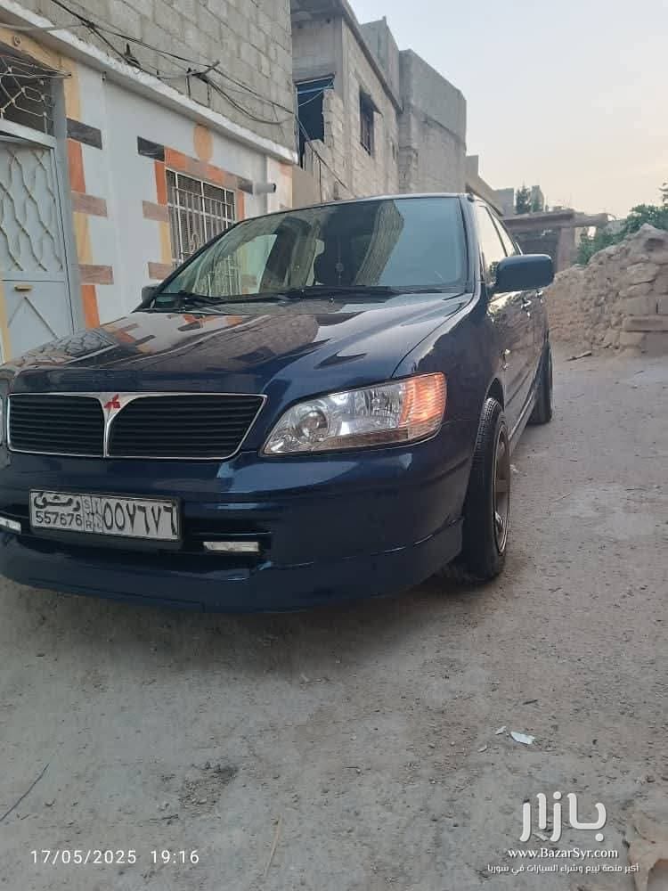 مستوبيشي لانسر هرم صنع 2001 تسجيل 2002 خالية العلام من الداخل والسقف زنار واطي مستوبيشي لانسر هرم صنع 2001 تسجيل 2002 خالية العلام من الداخل والسقف زنار واطي - متسوبيشي - 2001 - محافظة دمشق - صورة 2 من 3
