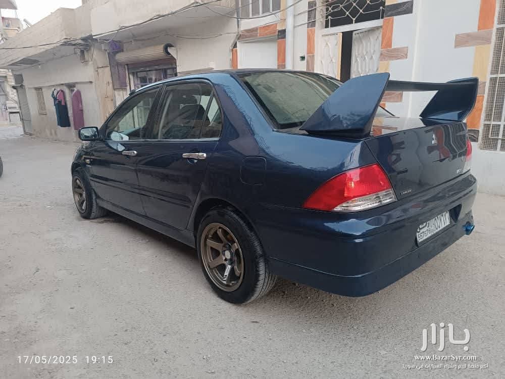 مستوبيشي لانسر هرم صنع 2001 تسجيل 2002 خالية العلام من الداخل والسقف زنار واطي مستوبيشي لانسر هرم صنع 2001 تسجيل 2002 خالية العلام من الداخل والسقف زنار واطي - متسوبيشي - 2001 - محافظة دمشق - صورة 1 من 3