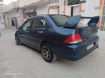 مستوبيشي لانسر هرم  صنع 2001 تسجيل 2002 خالية العلام من الداخل والسقف زنار واطي - محافظة دمشق