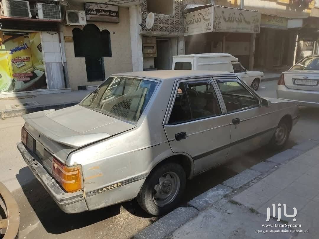 لانسر 83 للبيع بدمشق،،، (خالية من الداخل والخارج)✅ هيدروليك، بلور كهربا، تقبل زنار لانسر 83 للبيع بدمشق،،، (خالية من الداخل والخارج)✅ هيدروليك، بلور كهربا، تقبل زنار - سيات - محافظة دمشق - صورة 3 من 3