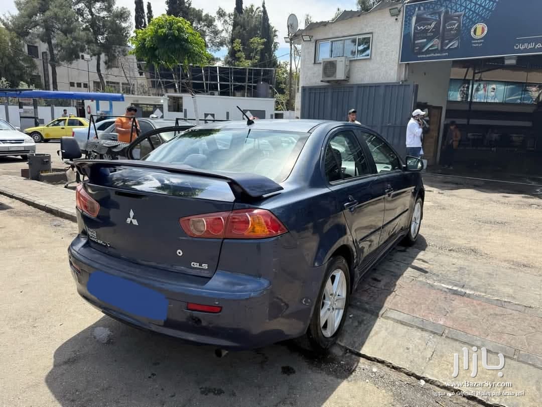 للبيع لانسر قرش 2009 خاليه جوا وسقف للبيع لانسر قرش 2009 خاليه جوا وسقف - متسوبيشي - 2009 - محافظة دمشق - صورة 4 من 4