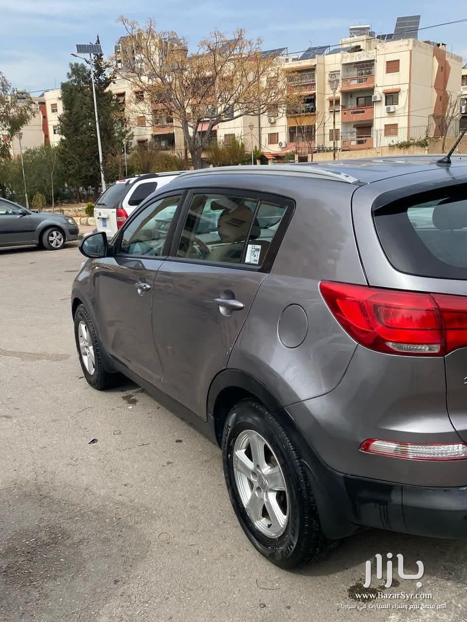 كيا سبورتاج موديل 2015 المواصفات نص فل 4 سلندر 2000cc كيا سبورتاج موديل 2015 المواصفات نص فل 4 سلندر 2000cc - كيا - 2015 - محافظة دمشق - صورة 4 من 5