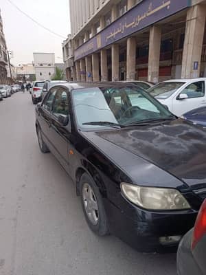 مازدا 323 جوهرة 2002/2003 خالية من الداخل والخارج - محافظة دمشق