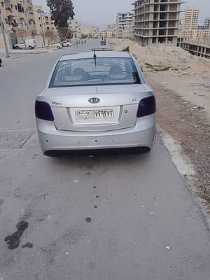 بسم الله الرحمن الرحيم يا جبار يا الله سياره للبيع ريو موديل 10 تسجيل 10 خالي العلم بره جوه الوصف دقيق ماتور 100% غرفه 100% غماز مرايه طارت فورتي  - محافظة دمشق