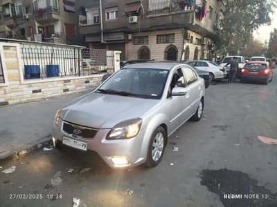 للبيع كيا ريو ٢٠١١/٢٠١١ خالية من الداخل ولا خدش بحالة الوكالة تمامن زنار خارجي جرد لون مافيها بلور مبدل مفتاحين الوكالة  - محافظة دمشق