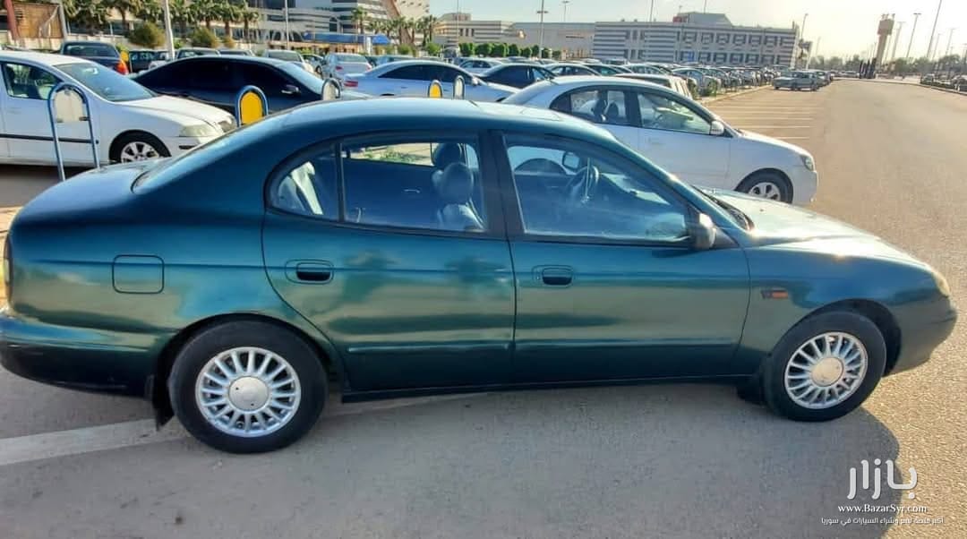 دايو لوكنزا 2002/2002 خالية من جوا تماما - زنار نضافة من برا • كاملة الوصف • محرك 2000 CC دايو لوكنزا 2002/2002 خالية من جوا تماما - زنار نضافة من برا • كاملة الوصف • محرك 2000 CC - دايو - 2002 - محافظة دمشق - صورة 6 من 6