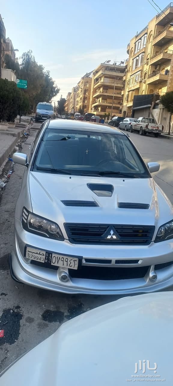 سورية نظامية بنزين لانسر ٢٠٠٢ المواصفات اتوماتيك اساسي ١٨ حصان جنط ١٧ سورية نظامية بنزين لانسر ٢٠٠٢ المواصفات اتوماتيك اساسي ١٨ حصان جنط ١٧ - فيات - 2002 - محافظة حلب - صورة 4 من 6