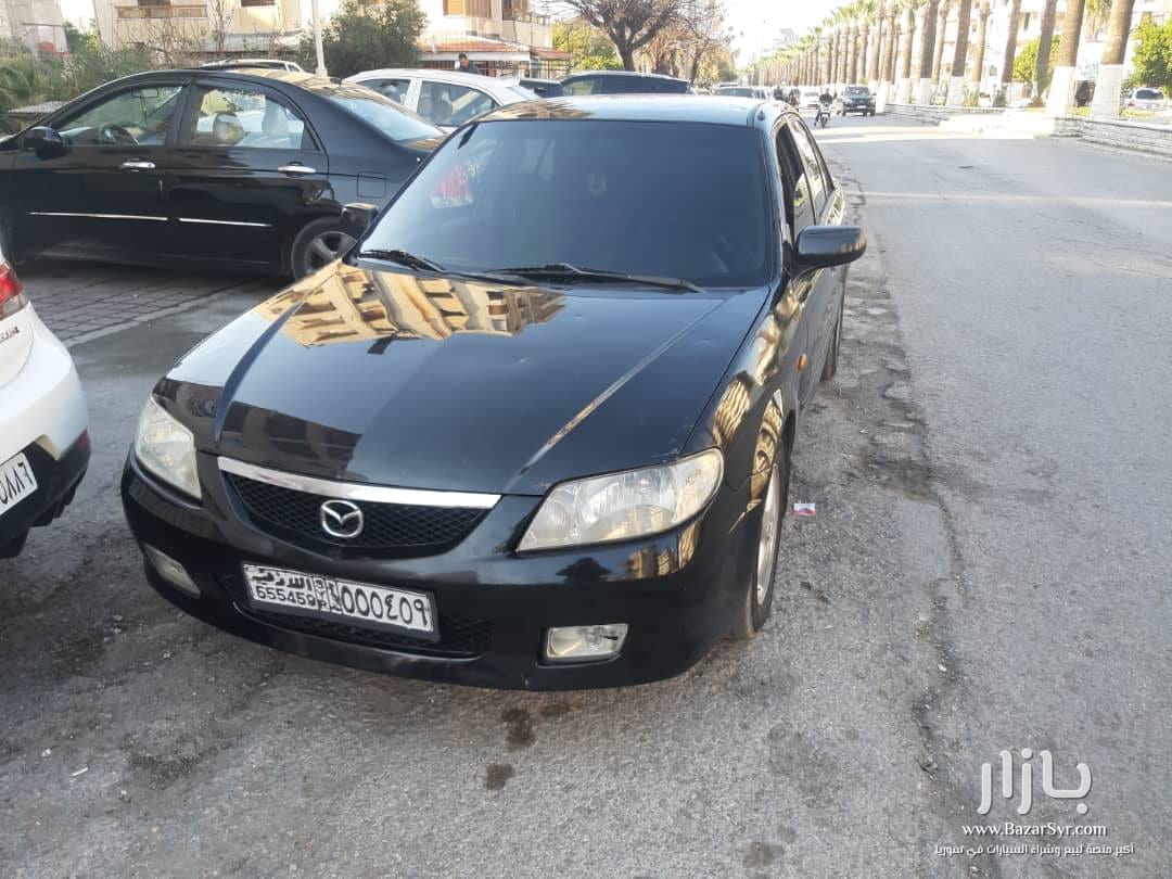 مازدا جوهرة موديل ٢٠٠٣ خالية برا وجوا مازدا جوهرة موديل ٢٠٠٣ خالية برا وجوا - مازدا - 2003 - محافظة دمشق - صورة 1 من 4