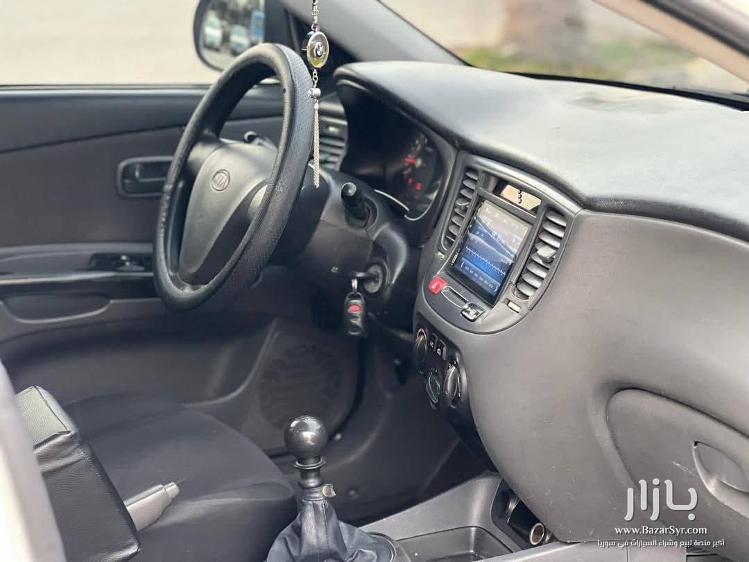 ريو ٢٠١٠ تسجيل ٢٠٠٩ خالية من جوا والسقف من برا جنب بويا كير عادي ريو ٢٠١٠ تسجيل ٢٠٠٩ خالية من جوا والسقف من برا جنب بويا كير عادي - كيا - 2010 - محافظة دمشق - صورة 3 من 4