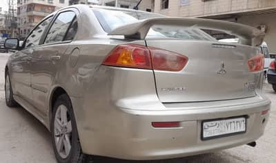 متسوبيشي لانسر قرش 2008 /2009  خاليه جوا وسقف وزنار واطي نضافه عالية - محافظة دمشق