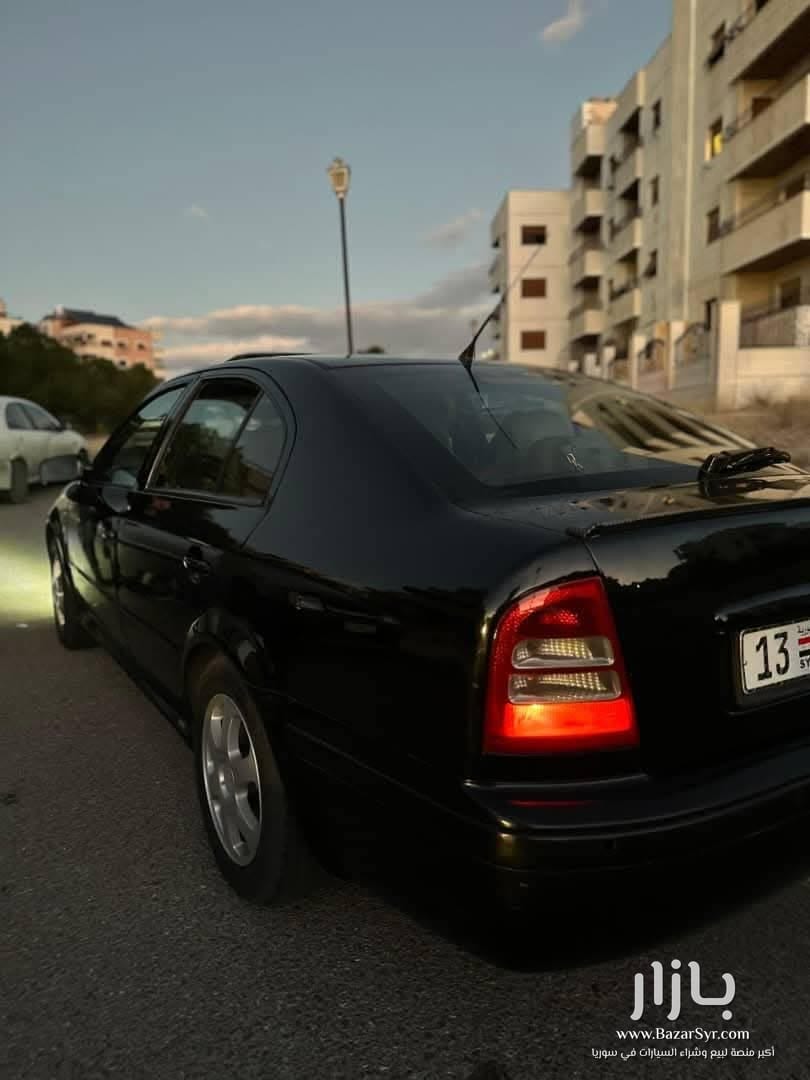 سكودا اوكتافيا ٢٠٠٢ خالية جوا وسقف اكمل وصف سكودا اوكتافيا ٢٠٠٢ خالية جوا وسقف اكمل وصف - سكودا - 2002 - محافظة دمشق - صورة 5 من 5