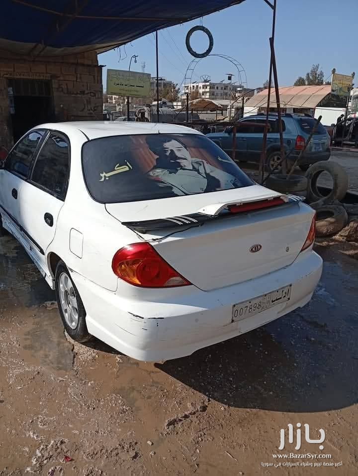 بسم الله نبدا سياره كيا سيراتو موديل 2003 محرك ديزل فوكس بخاخ رفيع جديد مافي بخار كهرباء بل الكامل شغاله بلور كهربا مجنطه مرايا كهربا دوزان دهب دولاليب  - كيا - 2003 - محافظة إدلب - صورة 4 من 6