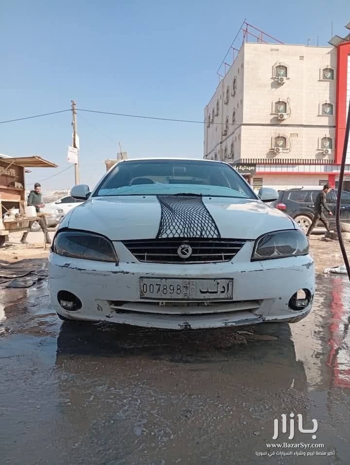 بسم الله نبدا سياره كيا سيراتو موديل 2003 محرك ديزل فوكس بخاخ رفيع جديد مافي بخار كهرباء بل الكامل شغاله بلور كهربا مجنطه مرايا كهربا دوزان دهب دولاليب  - كيا - 2003 - محافظة إدلب - صورة 6 من 6