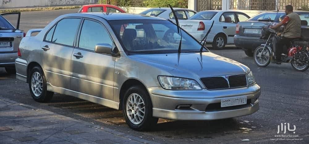 متسوبيشي لانسر الهرم ١٦٠٠ سي سي اوتوماتيك موديل 2003 - متسوبيشي - 2003 - محافظة حمص - صورة 3 من 5
