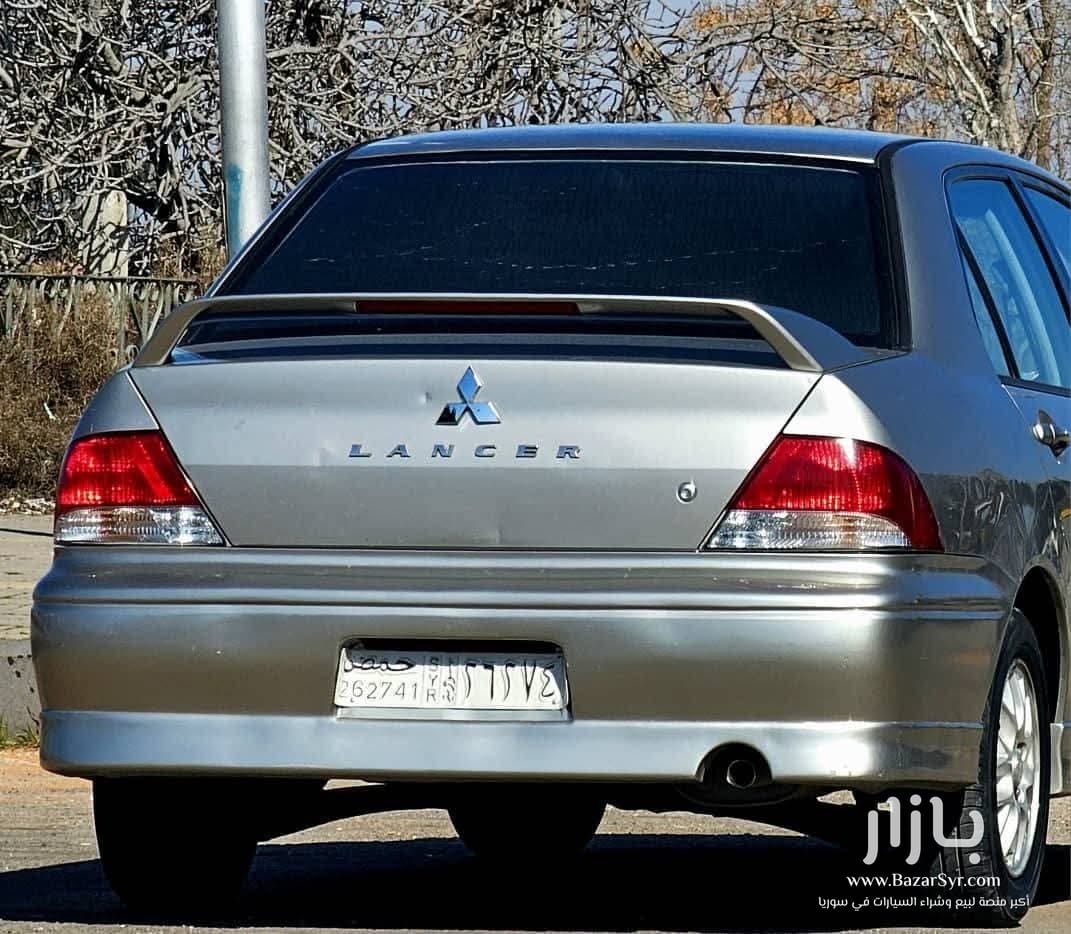 متسوبيشي لانسر الهرم ١٦٠٠ سي سي اوتوماتيك موديل 2003 - متسوبيشي - 2003 - محافظة حمص - صورة 5 من 5