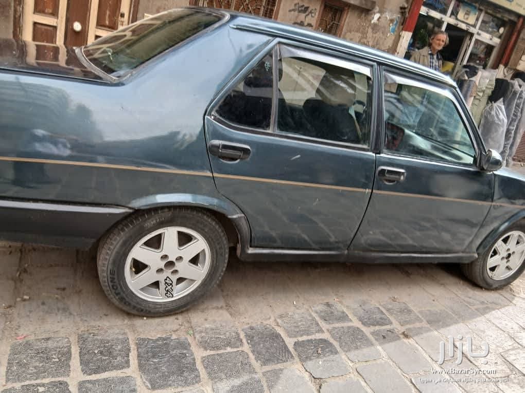 شاهين دوغان موديل ٢٠٠٣ محرك ودوزان ممتاز شاهين دوغان موديل ٢٠٠٣ محرك ودوزان ممتاز - دودج - 2003 - محافظة دمشق - صورة 1 من 4