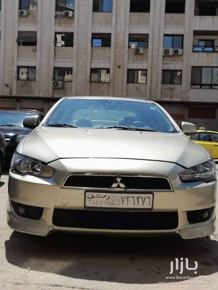 متسوبيشي لانسر قرش 2008 /2009  خاليه جوا وسقف وزنار واطي نضافه - متسوبيشي - 2008 - محافظة دمشق - صورة 2 من 5