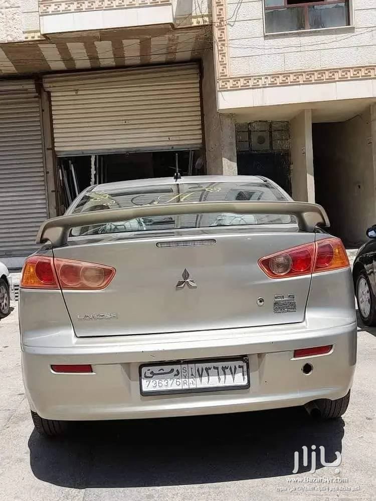 متسوبيشي لانسر قرش 2008 /2009  خاليه جوا وسقف وزنار واطي نضافه - متسوبيشي - 2008 - محافظة دمشق - صورة 3 من 5