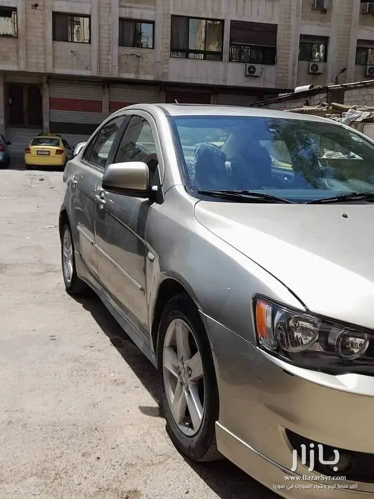متسوبيشي لانسر قرش 2008 /2009  خاليه جوا وسقف وزنار واطي نضافه - متسوبيشي - 2008 - محافظة دمشق - صورة 4 من 5