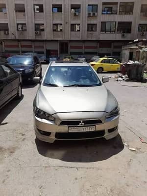متسوبيشي لانسر قرش 2008 /2009  خاليه جوا وسقف وزنار واطي نضافه - محافظة دمشق